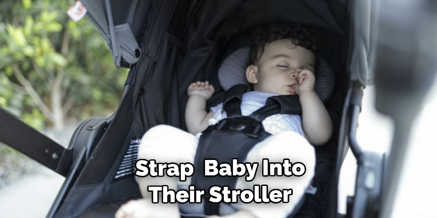  Strap Your Baby Into Their Stroller
