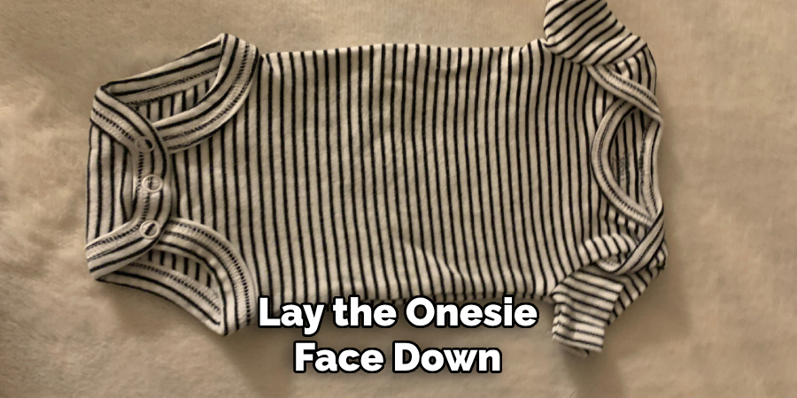 Lay the Onesie Face Down